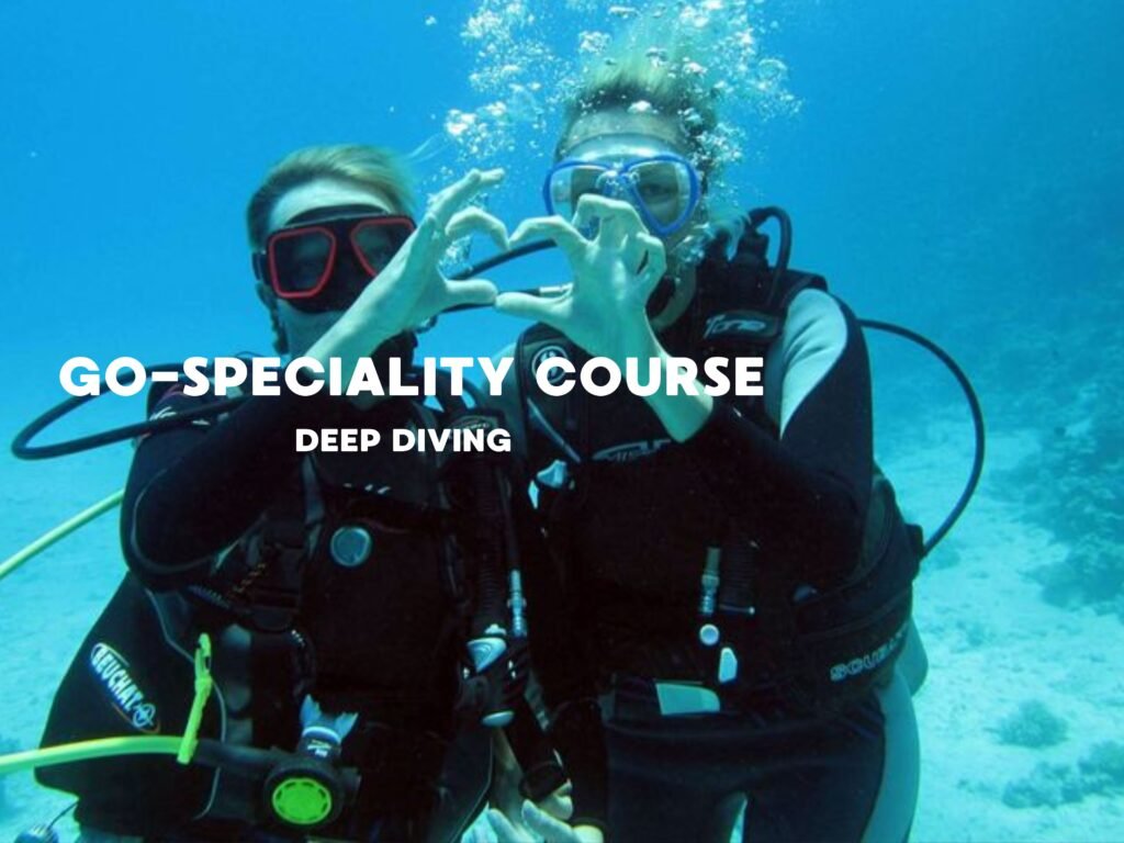 Two scuba divers underwater during Deep Diving specialty course training