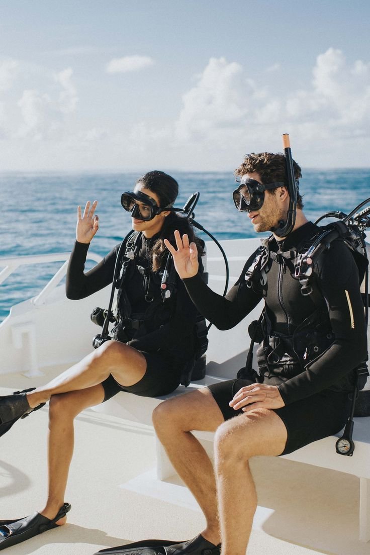 romantic couple diving,in komodo labuan bajo