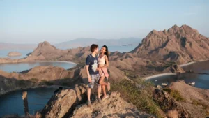 Romantic couple enjoying the panoramic view of Padar Island in Komodo National Park with Visit Labuan Bajo Komodo